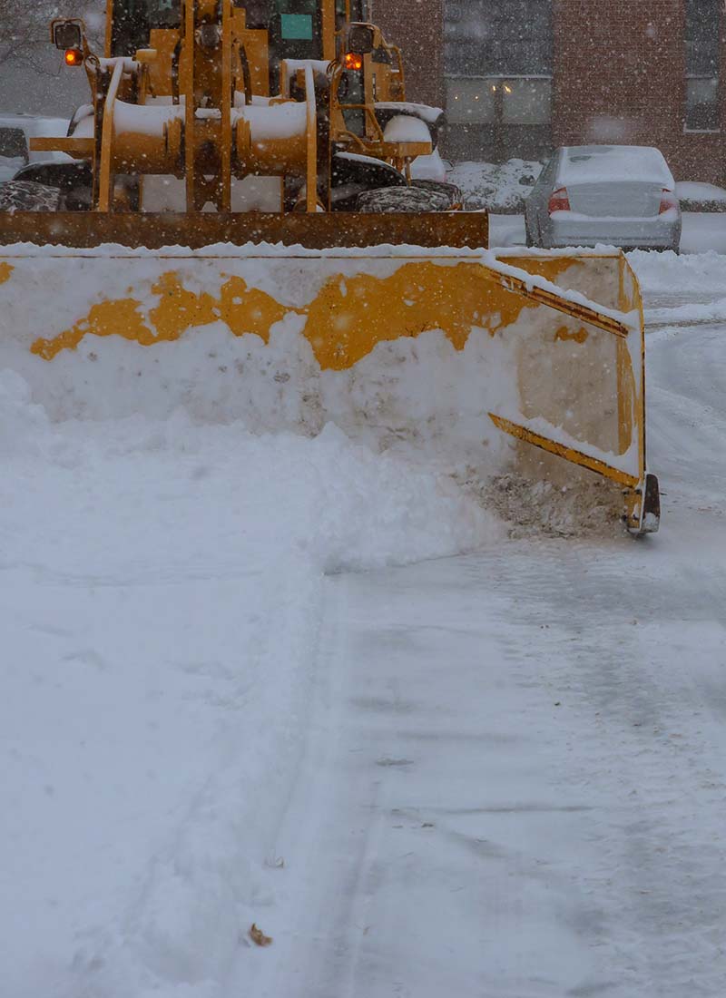 commercial snow removal in with snow plow